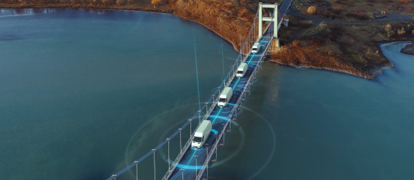 Four vans driving on a bridge with pulses surrounding them