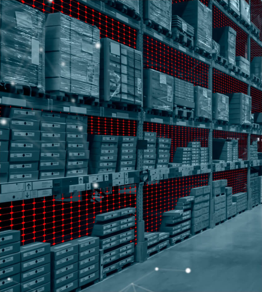 Racks in a warehouse stocked with products on pallets